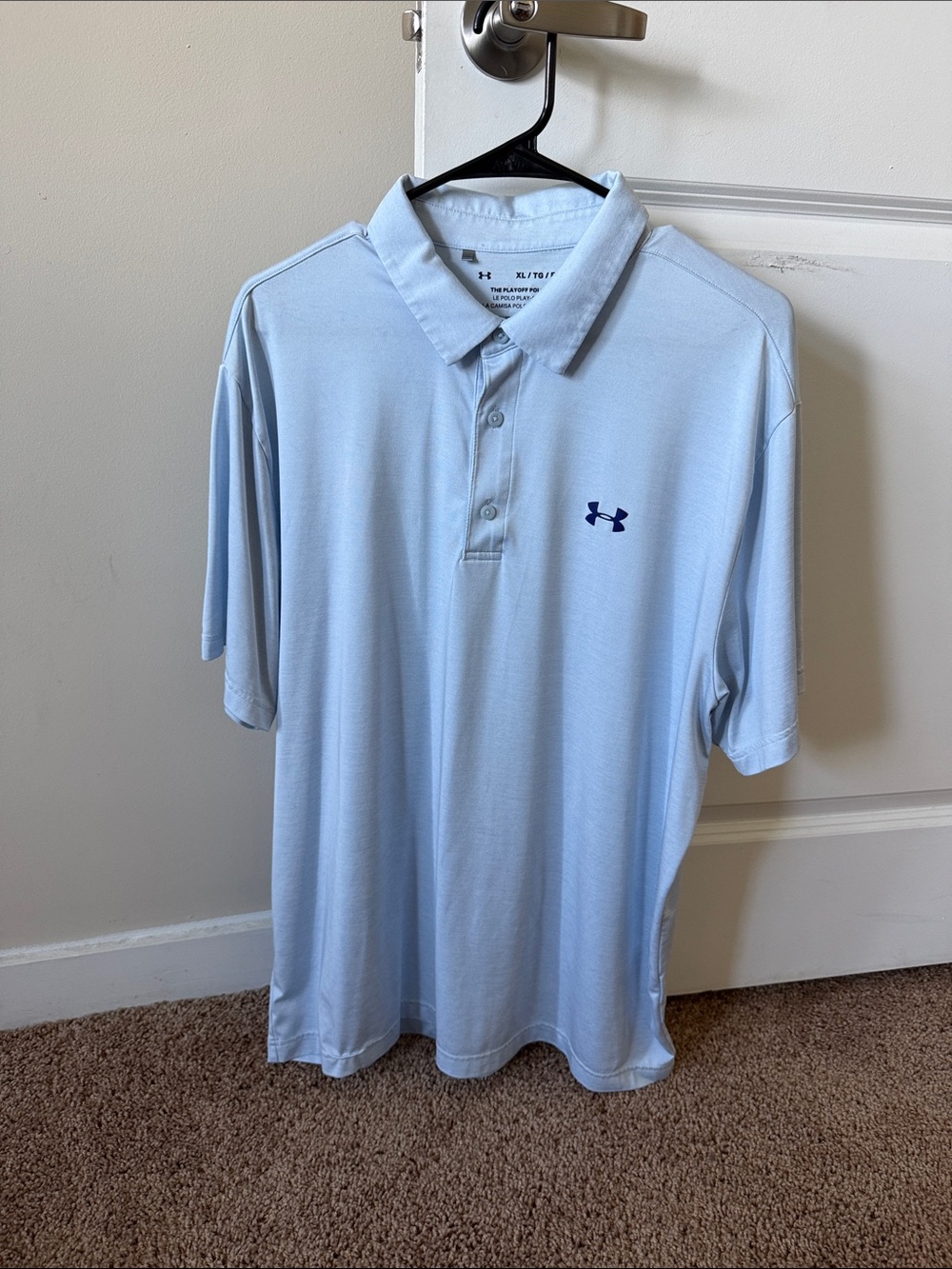 Under Armour Men’s Pale Blue Polo with Navy Logo golf